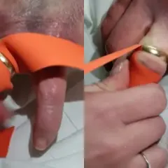 Pomoc w zdjęciu pierścionka z bardzo spuchniętego palca przy użyciu pomarańczowej wstążki.